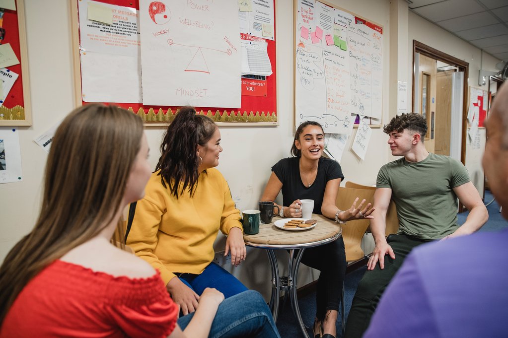 A group of young adults talking